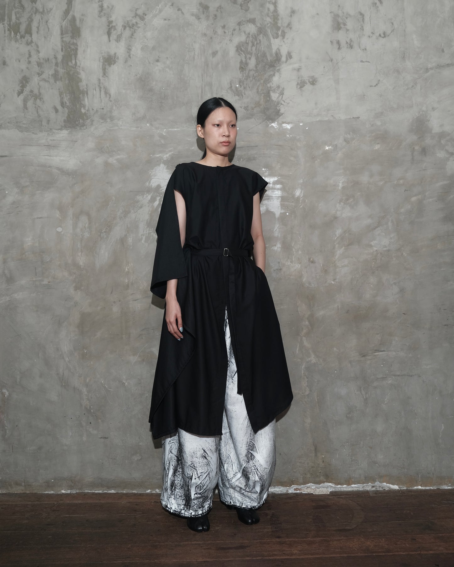 Kelawar Draped in Black