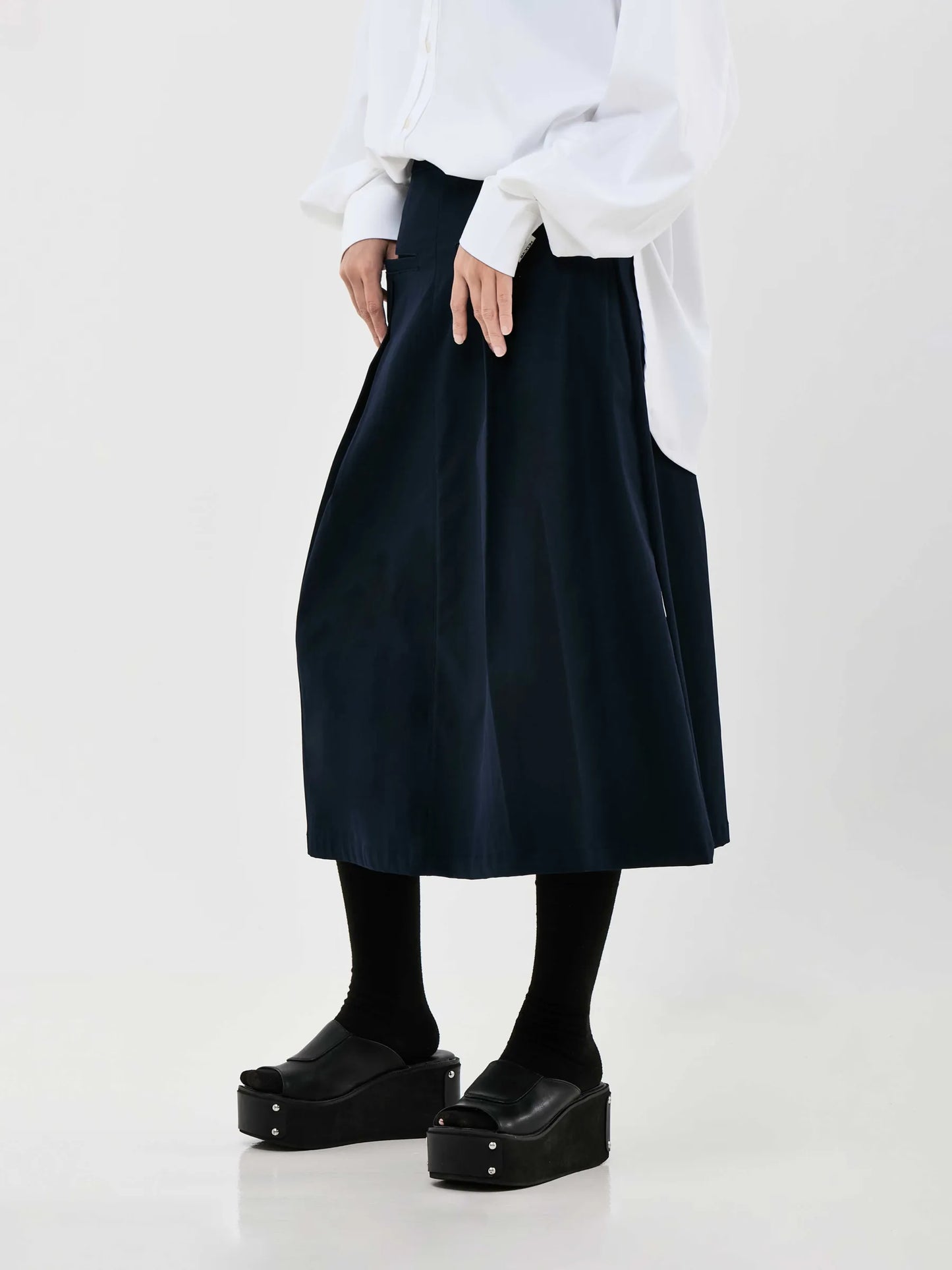 MA-NY WAYS BOX PLEATED MIDI SKIRT | NAVY BLUE