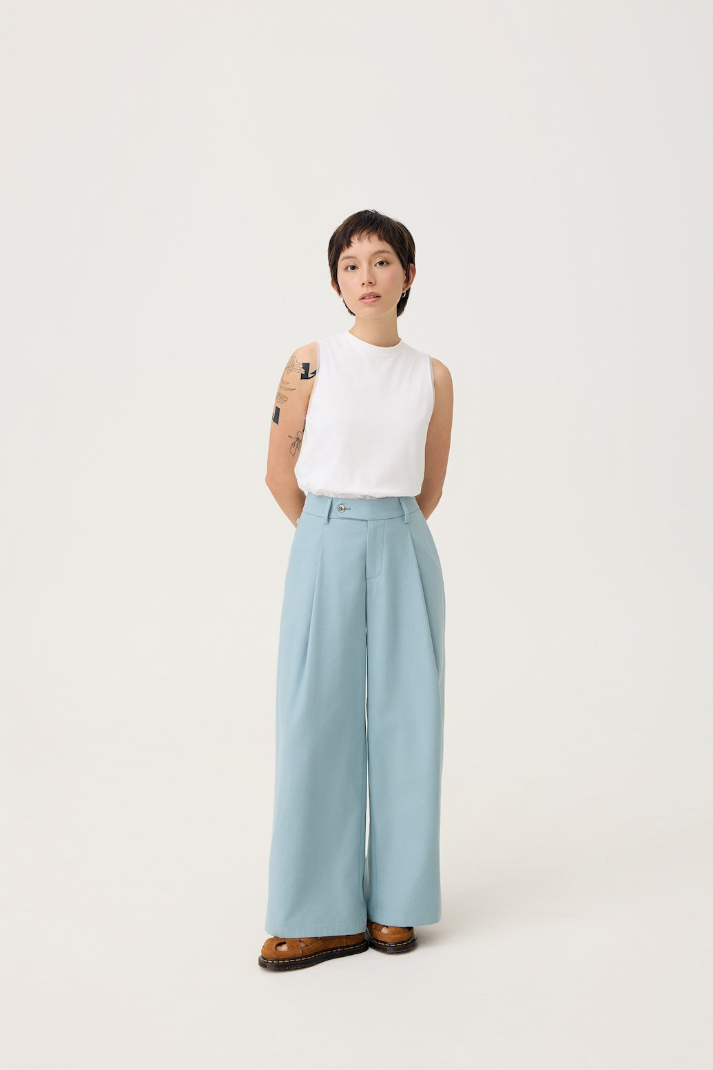 NAGARE PLEAT TROUSERS IN STEEL BLUE