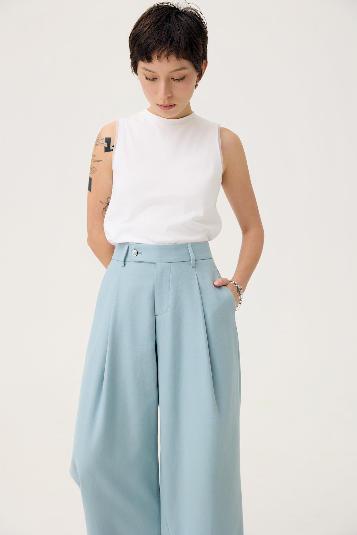 NAGARE PLEAT TROUSERS IN STEEL BLUE