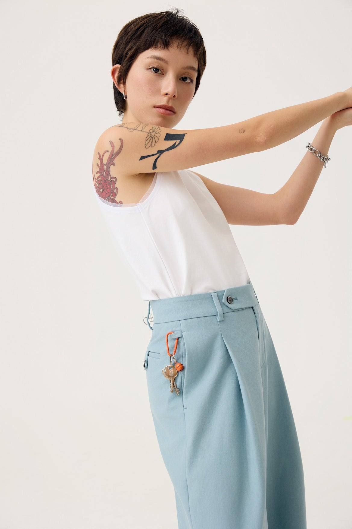 NAGARE PLEAT TROUSERS IN STEEL BLUE