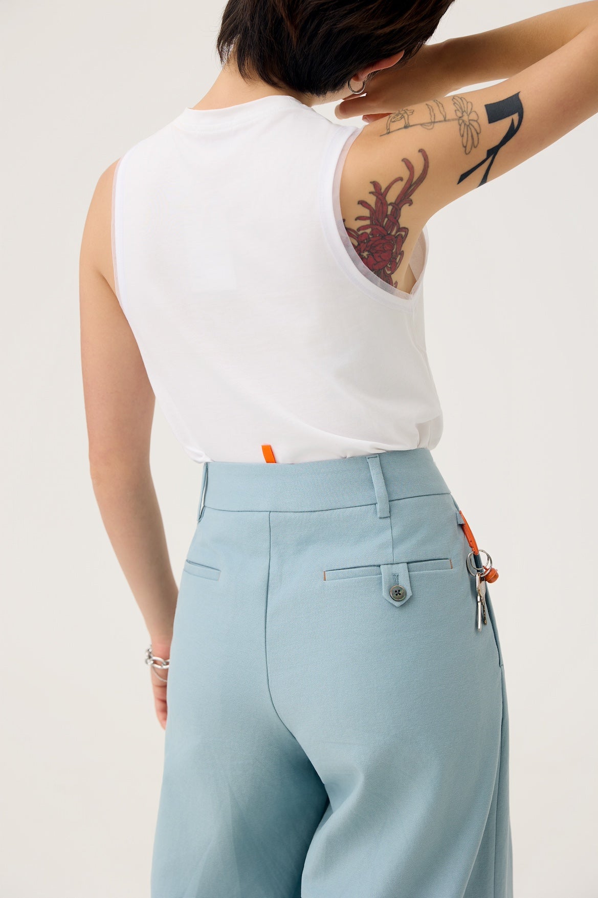 NAGARE PLEAT TROUSERS IN STEEL BLUE