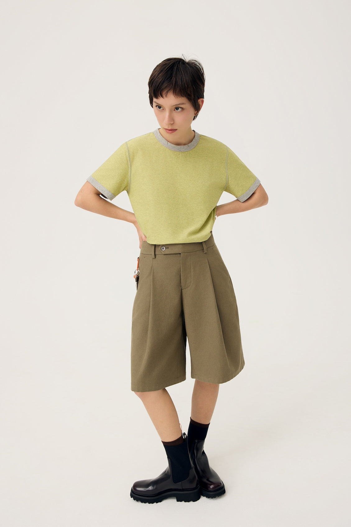 NAGI PLEAT SHORTS IN OLIVE MIST