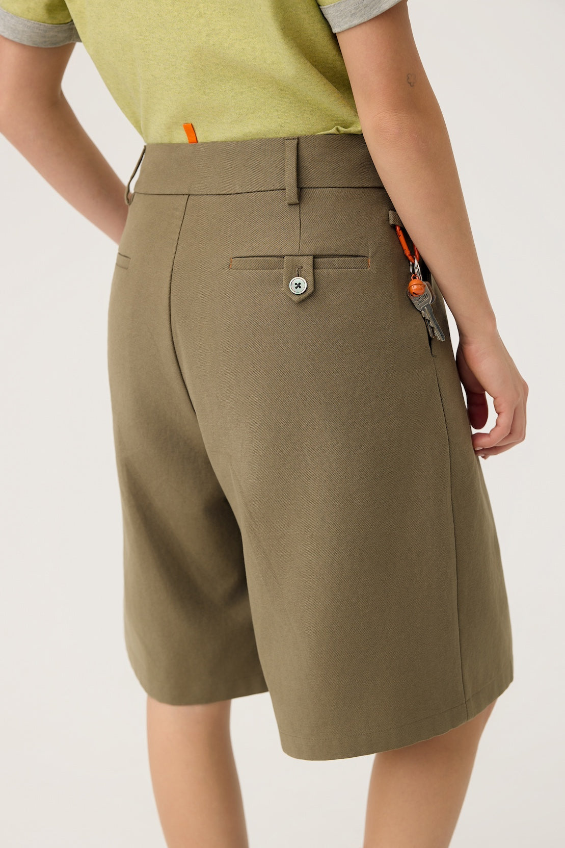NAGI PLEAT SHORTS IN OLIVE MIST