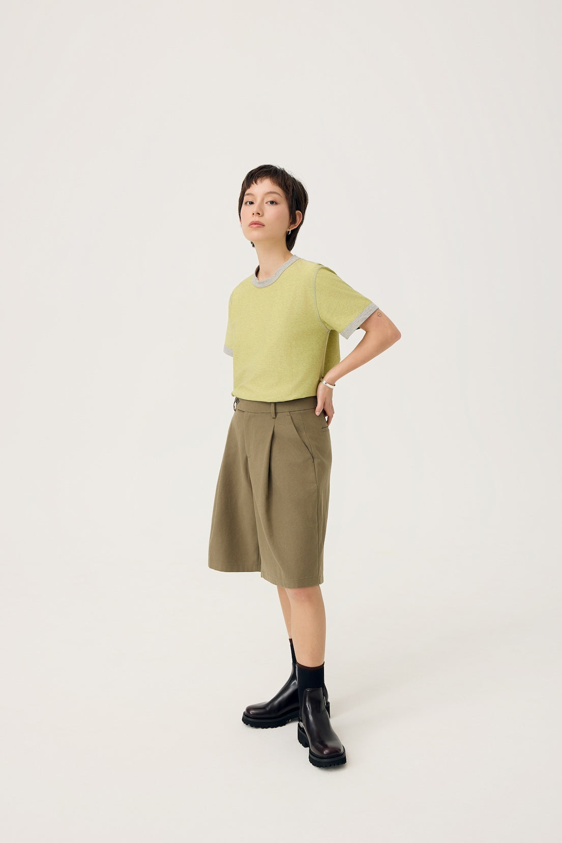 NAGI PLEAT SHORTS IN OLIVE MIST