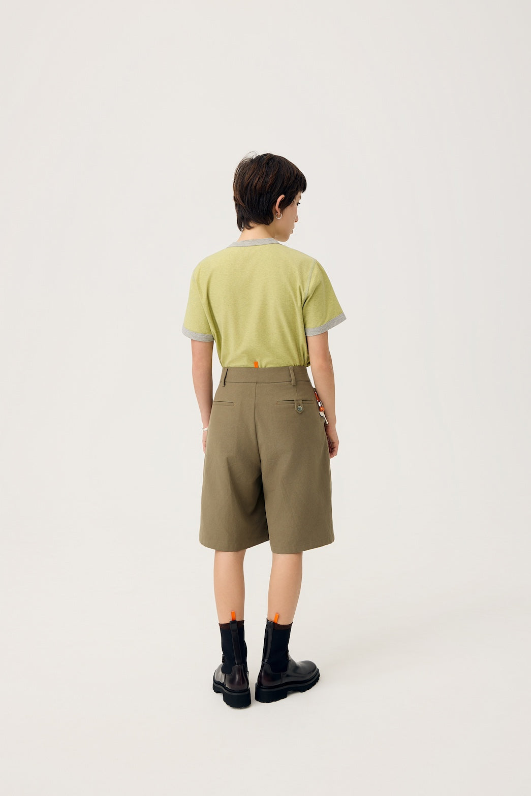 NAGI PLEAT SHORTS IN OLIVE MIST