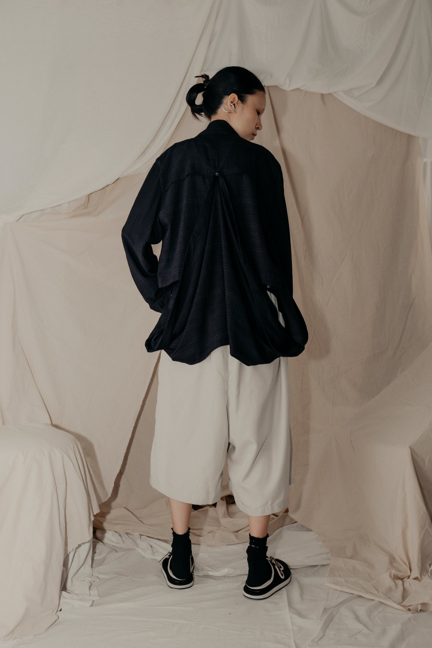 Asymmetrical Fly Pocket Pants In Cream