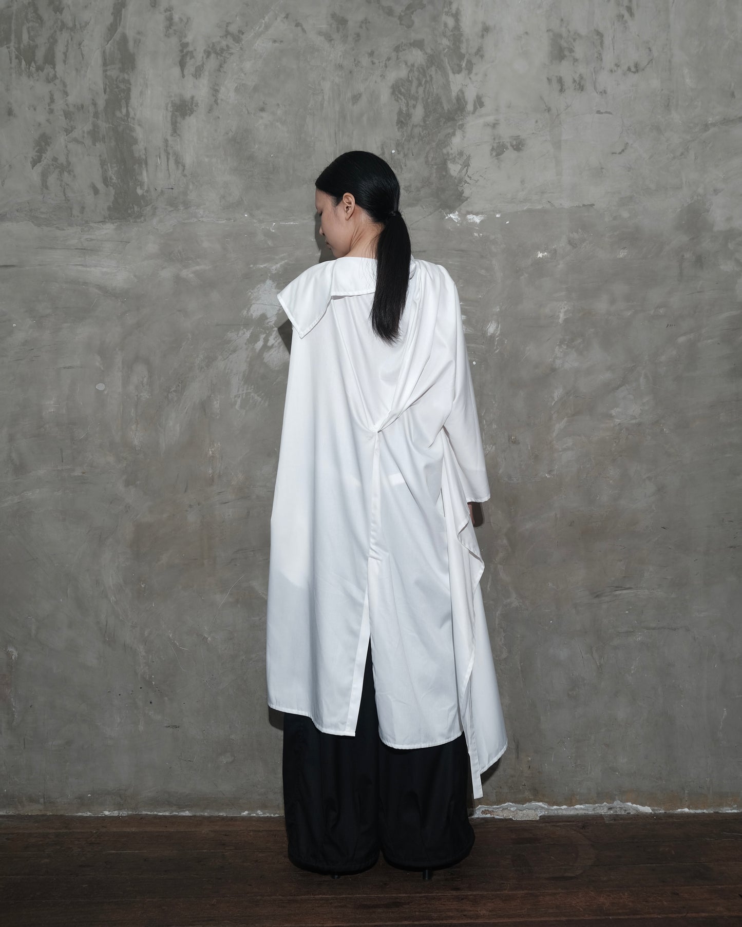 Kelawar Draped in White