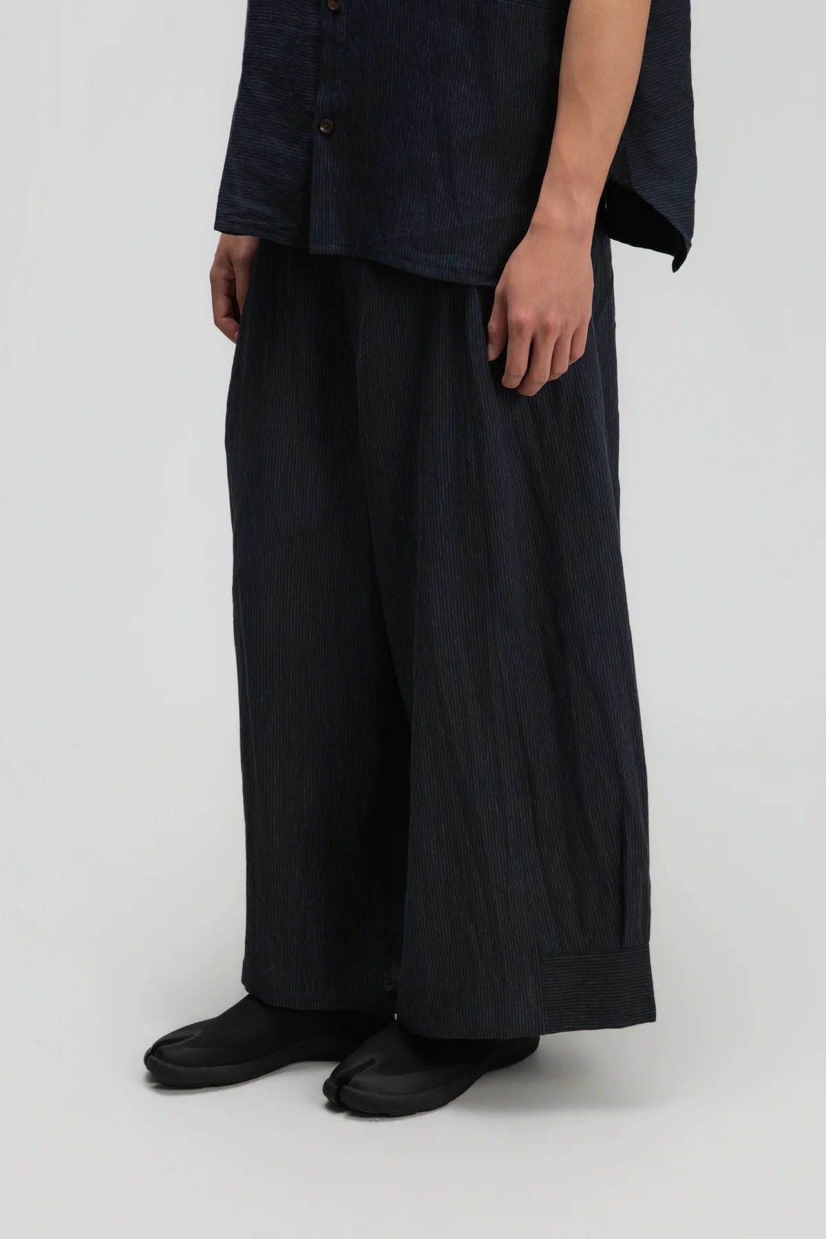 Gender Neutral Pleated Hem Ankle Pants (Navy Blue Stripe)