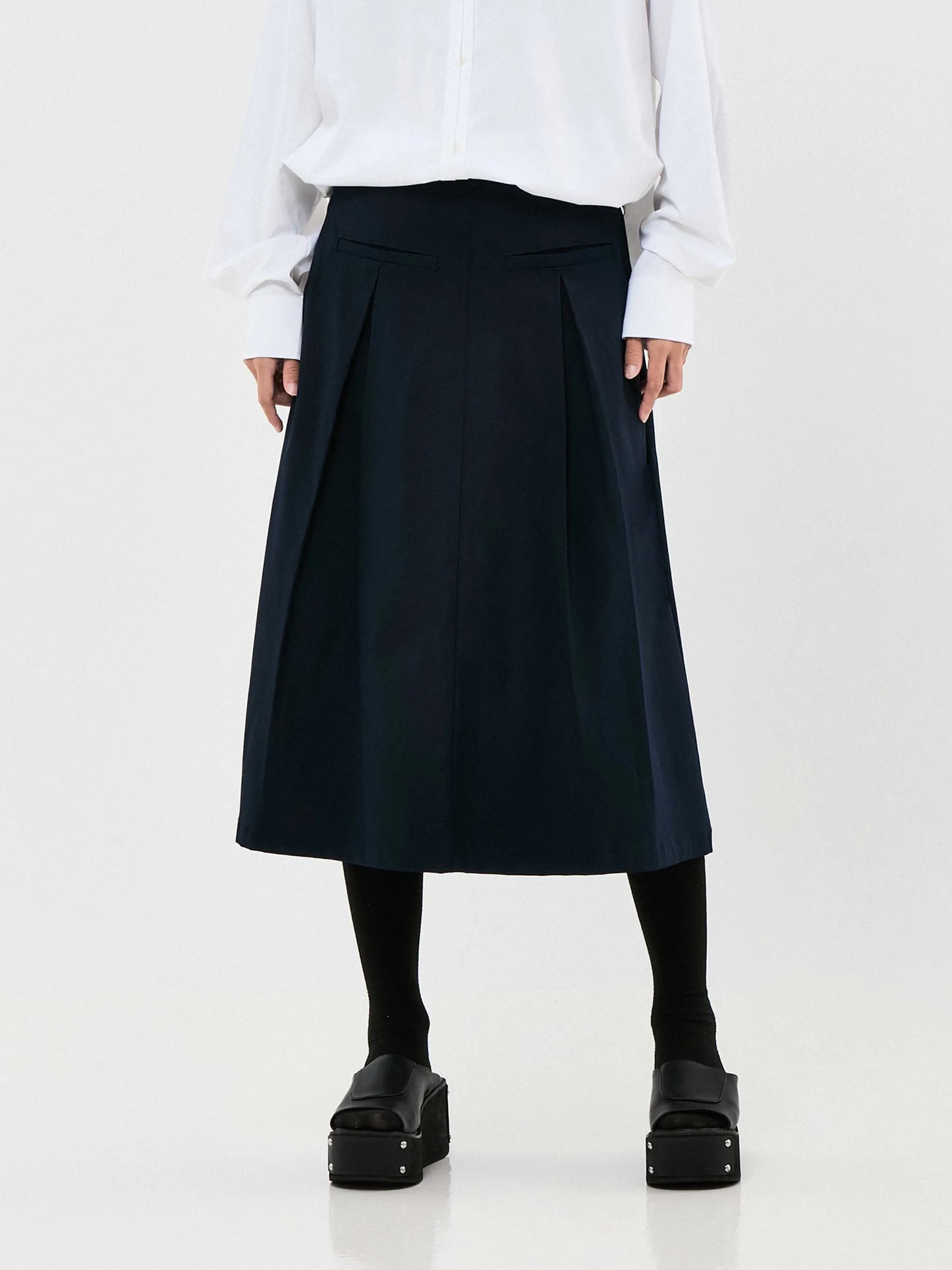 MA-NY WAYS BOX PLEATED MIDI SKIRT | NAVY BLUE